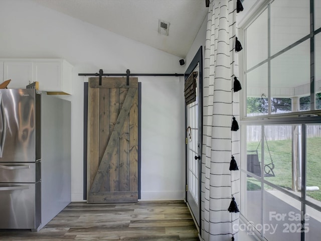 1488 Meadow Glen Ln, Rock Hill, SC 29730 - bathroom with vaulted ceiling, plenty of natural light, and wood finished floors