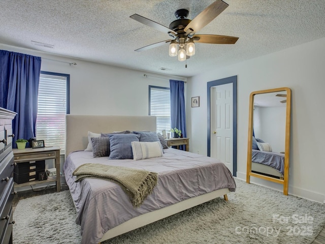 1488 Meadow Glen Ln, Rock Hill, SC 29730 - bedroom featuring a textured ceiling, a ceiling fan, and baseboards