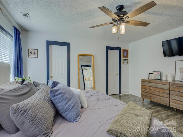 1488 Meadow Glen Ln, Rock Hill, SC 29730 - bedroom featuring a textured ceiling, wood finished floors, ceiling fan, and baseboards
