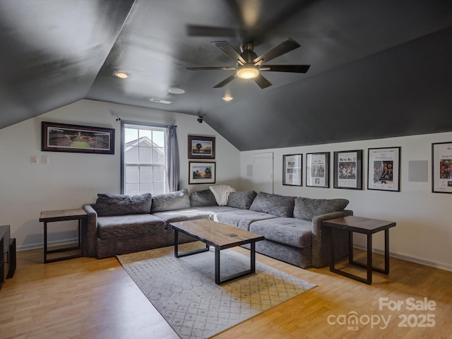 1488 Meadow Glen Ln, Rock Hill, SC 29730 - living area featuring vaulted ceiling, ceiling fan, light wood-type flooring, and baseboards