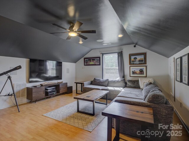 1488 Meadow Glen Ln, Rock Hill, SC 29730 - living room with a ceiling fan, light wood-style flooring, vaulted ceiling, and baseboards