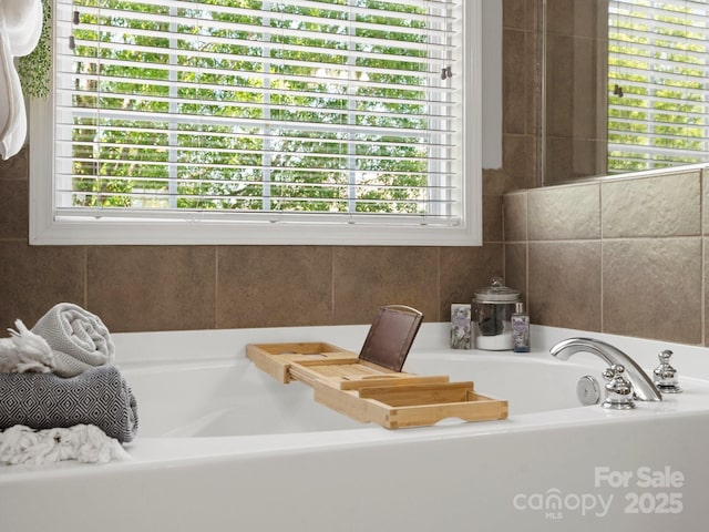 bathroom with a bath