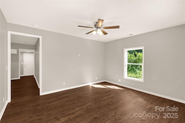 119 Washington St, York, SC 29745 - empty room featuring ceiling fan, baseboards, and dark wood-style flooring