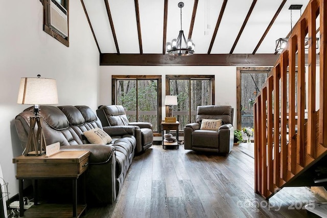 living room featuring hardwood / wood-style flooring, high vaulted ceiling, and a notable chandelier
