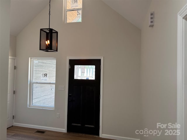 122 39th Avenue Ct NW, Hickory, NC 28601 - entrance foyer with high vaulted ceiling, dark wood-style flooring, and baseboards