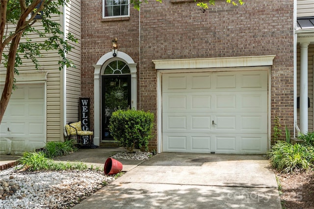 garage with driveway