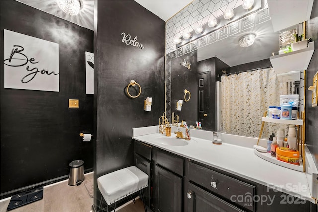 bathroom featuring vanity and wood finished floors