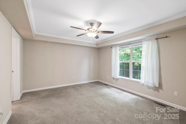 255 Jackson Loop Rd, Flat Rock, NC 28731 - empty room with carpet, crown molding, ceiling fan, and a tray ceiling