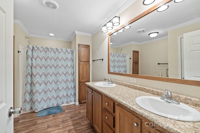 255 Jackson Loop Rd, Flat Rock, NC 28731 - bathroom with double vanity, wood finished floors, curtained shower, and crown molding
