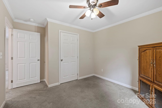 255 Jackson Loop Rd, Flat Rock, NC 28731 - unfurnished bedroom with carpet flooring, ornamental molding, baseboards, and a ceiling fan