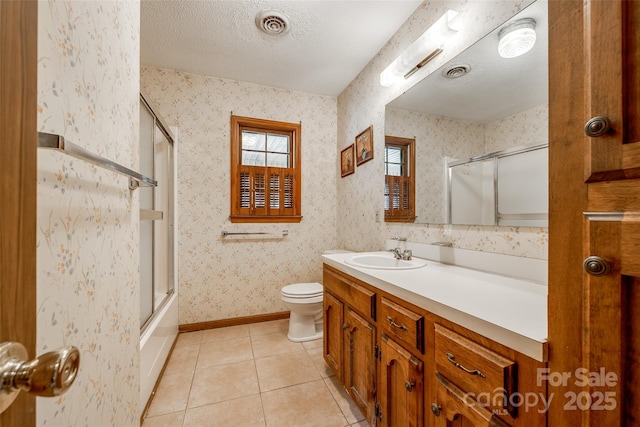 full bathroom with vanity, tile patterned flooring, visible vents, toilet, and wallpapered walls