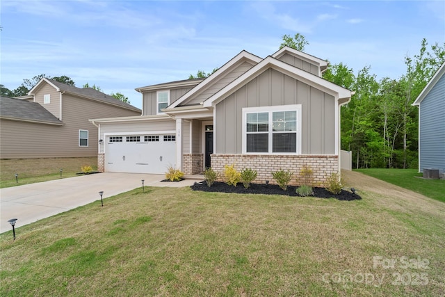 craftsman house with board and batten siding, a front lawn, a garage, and concrete driveway