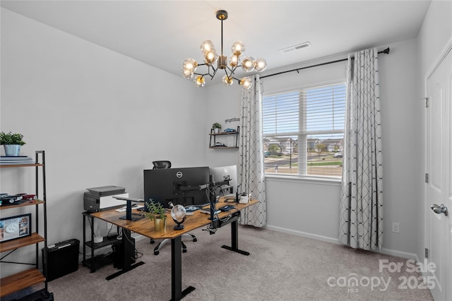 carpeted home office featuring visible vents, baseboards, and an inviting chandelier