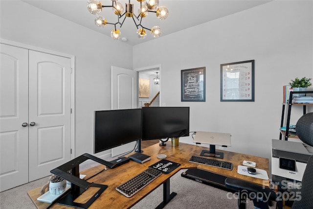 office featuring carpet floors and a notable chandelier