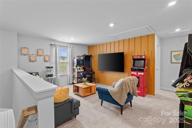 living area featuring attic access, light colored carpet, baseboards, visible vents, and recessed lighting