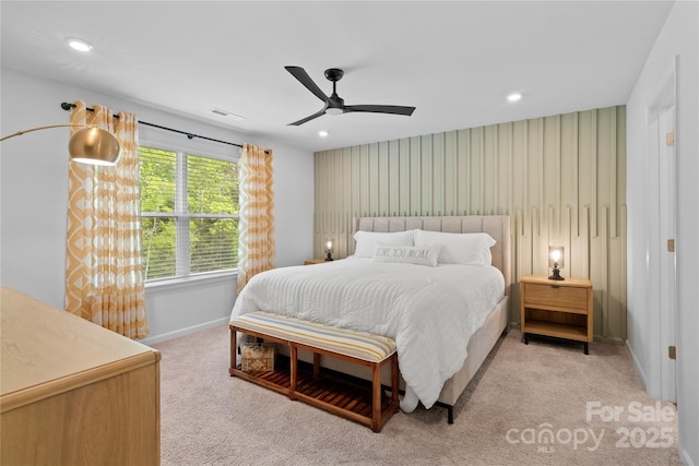 bedroom featuring light colored carpet, baseboards, visible vents, and recessed lighting