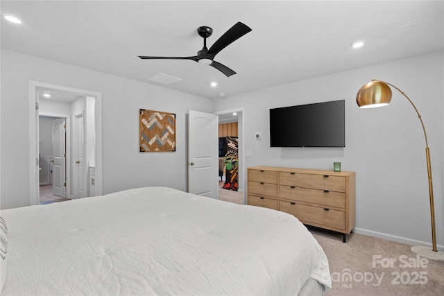 bedroom with light carpet, baseboards, recessed lighting, a ceiling fan, and connected bathroom