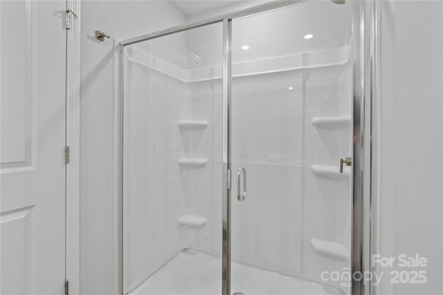 bathroom with a stall shower