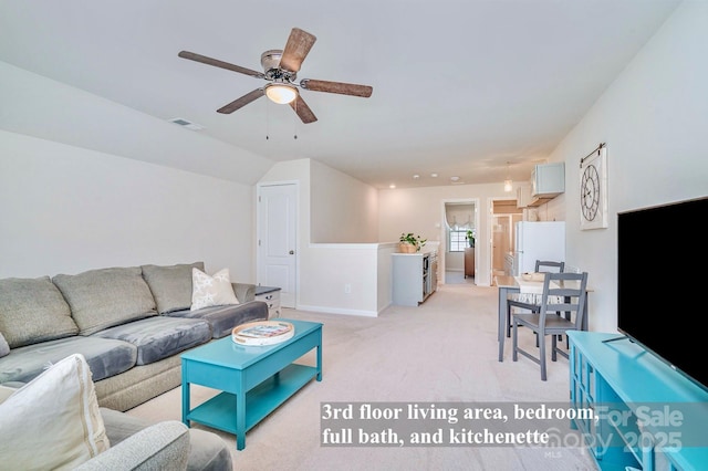 17231 Rider Wood Ln, Charlotte, NC 28278 - living area featuring light colored carpet, ceiling fan, and baseboards