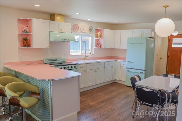 219 Flat Creek Rd, Black Mountain, NC 28711 - kitchen featuring freestanding refrigerator, stove, open shelves, a sink, and extractor fan