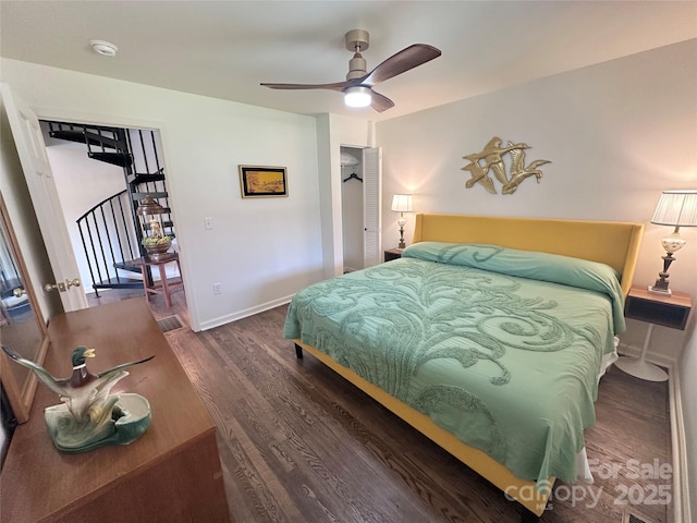 219 Flat Creek Rd, Black Mountain, NC 28711 - bedroom featuring baseboards, a ceiling fan, and wood finished floors