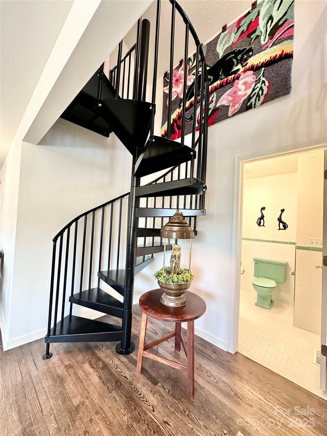 219 Flat Creek Rd, Black Mountain, NC 28711 - stairway with baseboards and wood finished floors