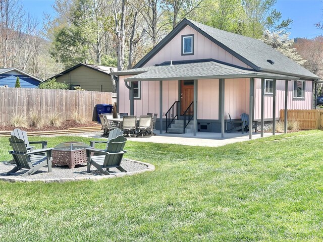 219 Flat Creek Rd, Black Mountain, NC 28711 - back of house with an outdoor fire pit, entry steps, a yard, and fence