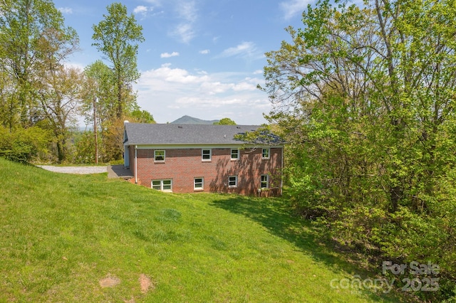 963 Kenham Pl SW, Lenoir, NC 28645 - rear view of house with a yard and brick siding
