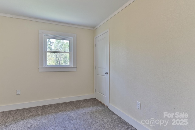 963 Kenham Pl SW, Lenoir, NC 28645 - carpeted spare room with crown molding and baseboards