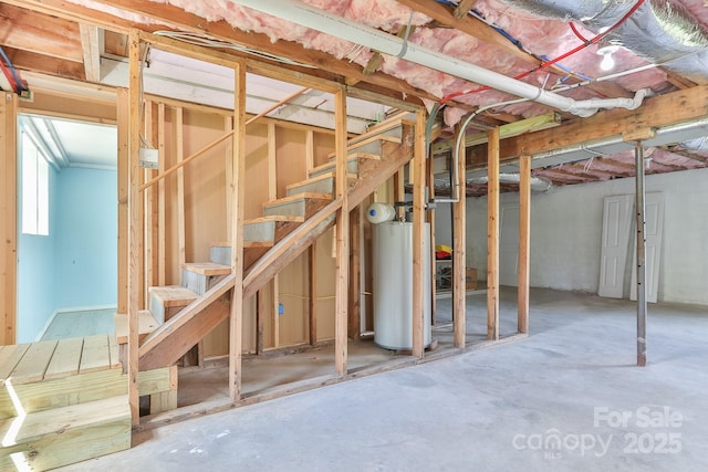 963 Kenham Pl SW, Lenoir, NC 28645 - basement with stairway and gas water heater