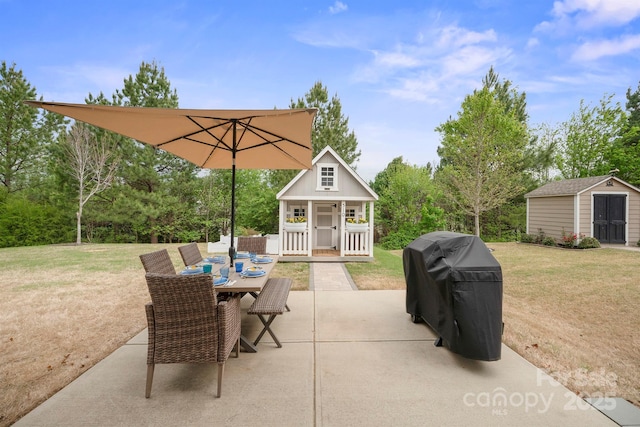 13115 Union Square Dr, Huntersville, NC 28078 - view of patio with an outbuilding, a shed, outdoor dining area, and grilling area