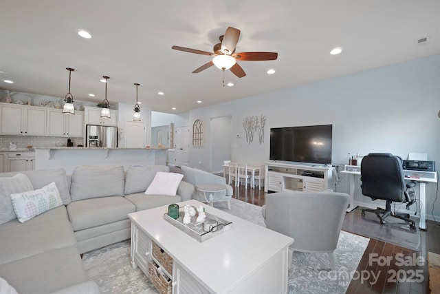 13115 Union Square Dr, Huntersville, NC 28078 - living room featuring ceiling fan, light wood finished floors, visible vents, and recessed lighting