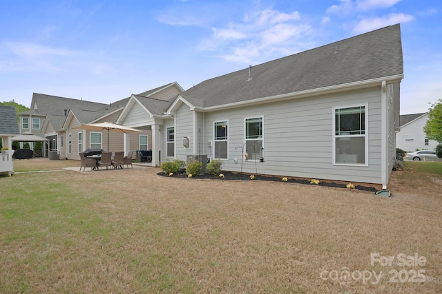 13115 Union Square Dr, Huntersville, NC 28078 - rear view of property with a yard and a patio