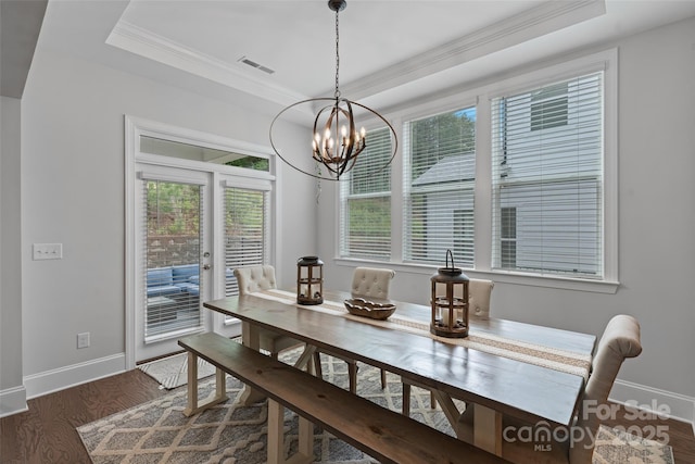 1390 Cedardale Ln, Denver, NC 28037 - dining space featuring a tray ceiling, ornamental molding, a chandelier, baseboards, and wood finished floors