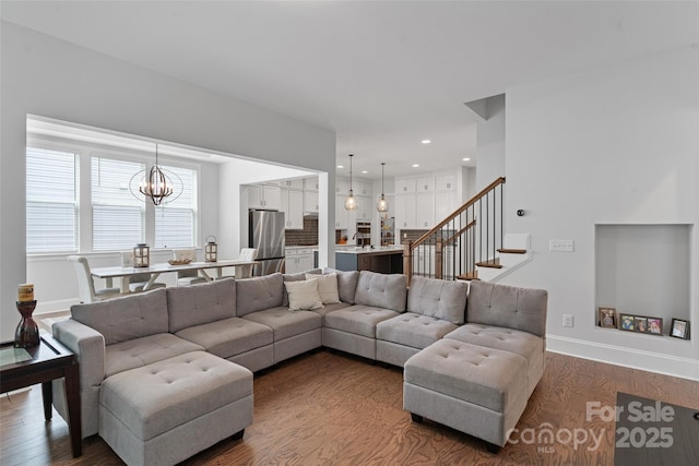 1390 Cedardale Ln, Denver, NC 28037 - living area featuring a chandelier, baseboards, dark wood-type flooring, stairway, and recessed lighting
