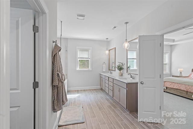 1390 Cedardale Ln, Denver, NC 28037 - ensuite bathroom with double vanity, wood finished floors, and baseboards