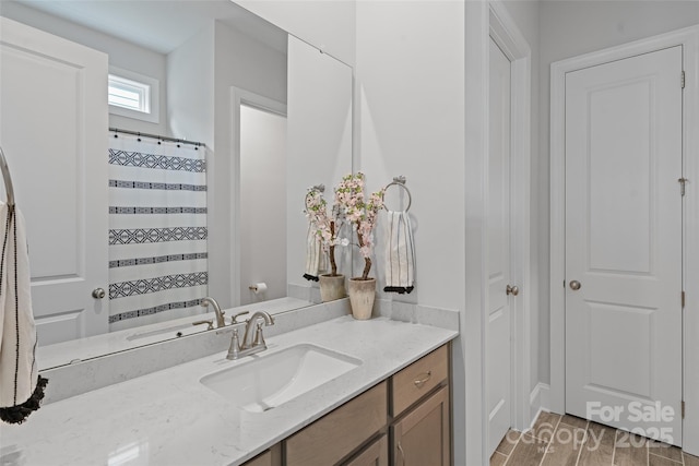1390 Cedardale Ln, Denver, NC 28037 - full bath with vanity, a shower with shower curtain, and wood finished floors