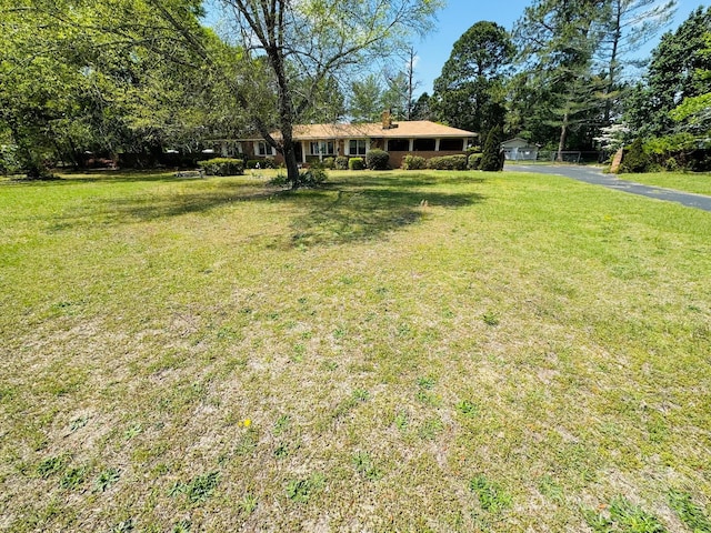 2480 Sumter Hwy, Bishopville, SC 29010 - view of yard featuring aphalt driveway