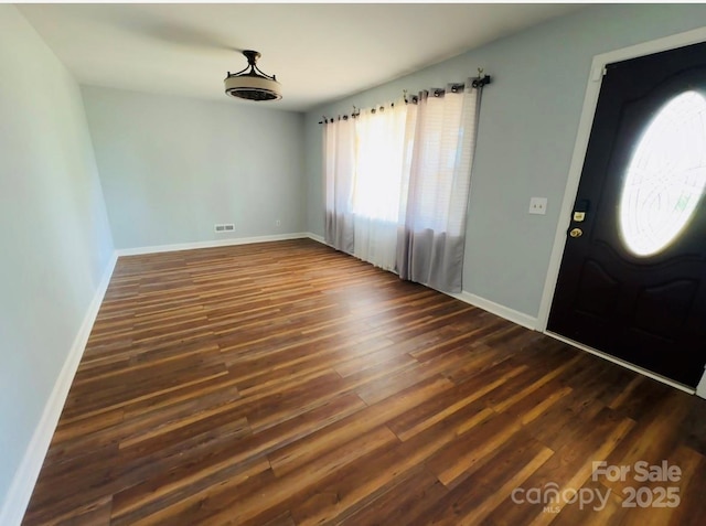 2480 Sumter Hwy, Bishopville, SC 29010 - foyer with baseboards, visible vents, and dark wood-style floors