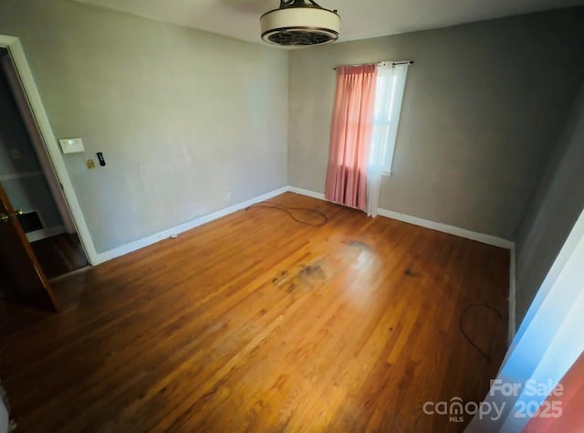 2480 Sumter Hwy, Bishopville, SC 29010 - empty room with baseboards and wood finished floors