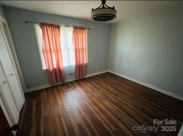 2480 Sumter Hwy, Bishopville, SC 29010 - interior space with dark wood finished floors and baseboards
