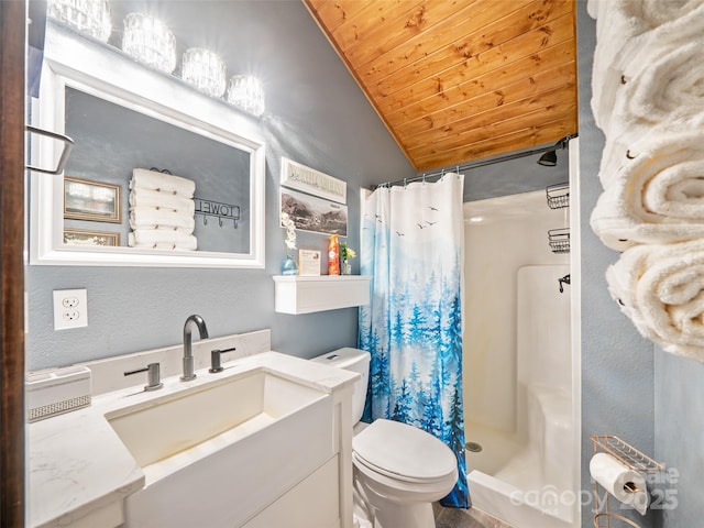 bathroom featuring lofted ceiling, toilet, wooden ceiling, and a stall shower