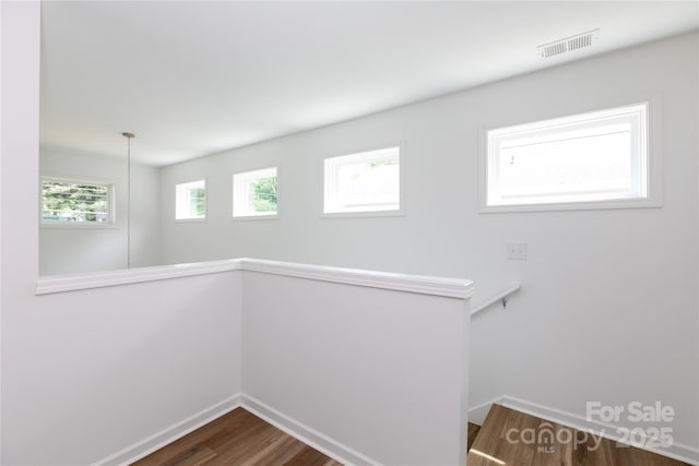 6223 Rockwell Blvd W, Charlotte, NC 28269 - interior space featuring visible vents, wood finished floors, and baseboards