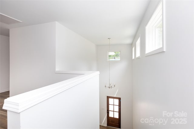 6223 Rockwell Blvd W, Charlotte, NC 28269 - entrance foyer with a chandelier and dark wood-style flooring