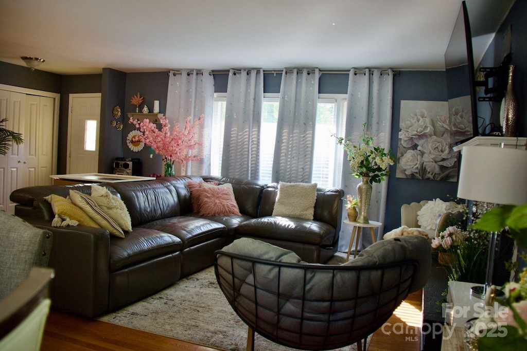 living room with wood finished floors