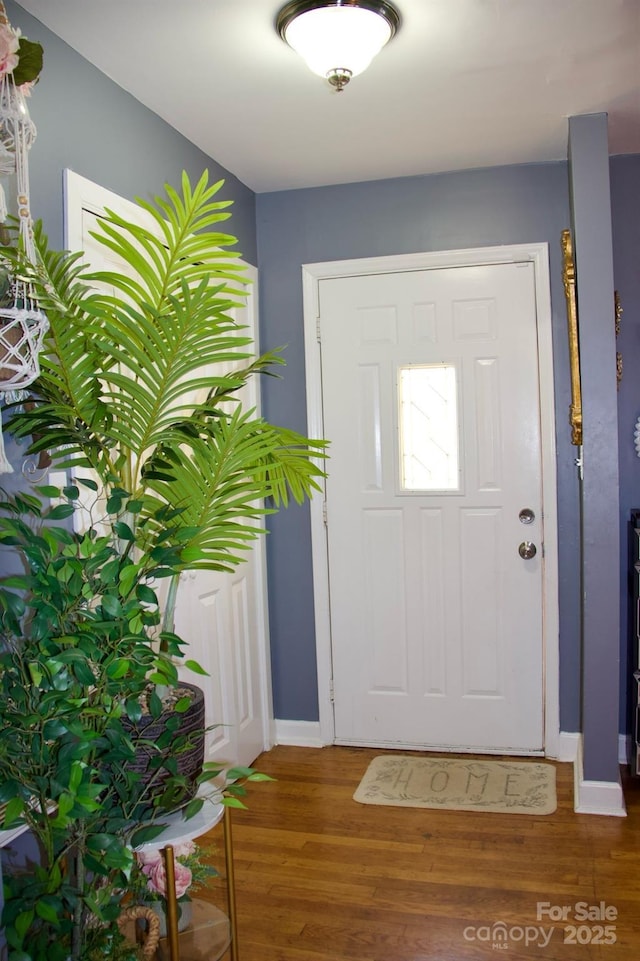 920 Squirrel Hill Rd, Charlotte, NC 28213 - entrance foyer featuring wood finished floors and baseboards