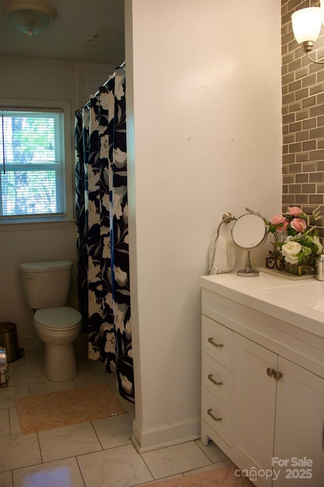 920 Squirrel Hill Rd, Charlotte, NC 28213 - full bath with vanity, a shower with shower curtain, and marble look tiles
