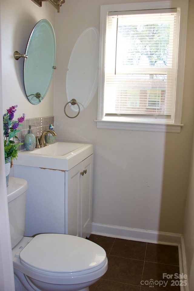 920 Squirrel Hill Rd, Charlotte, NC 28213 - half bathroom featuring vanity, tile patterned floors, and tasteful backsplash