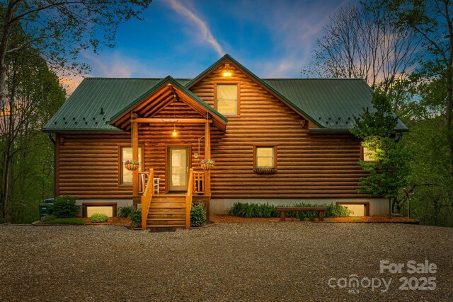 view of front of house featuring metal roof