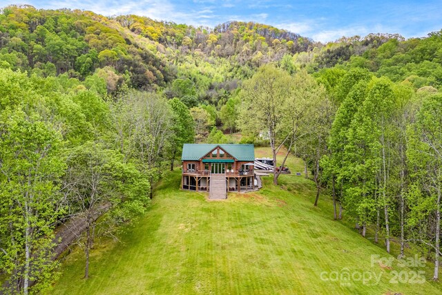 aerial view featuring a view of trees